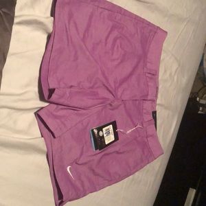 Nike gold did fit performance purple shorts
